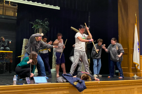 The villainous Jack, played by FHS Senior Ethan Pflomm, leads his camp on a pig hunt in Lord of the Flies.     